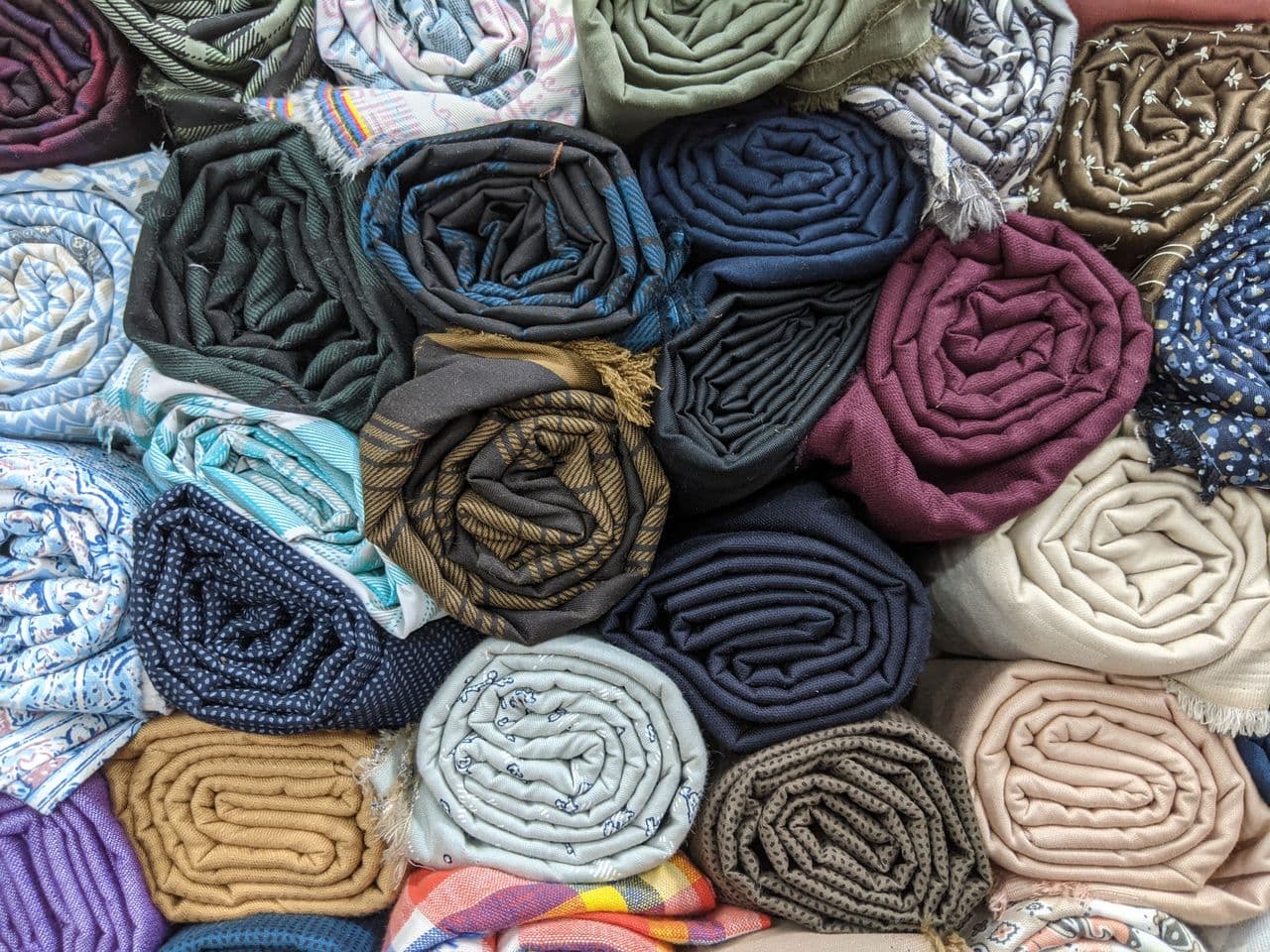 Make synthetic fabrics biodegrade to cut textile waste